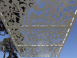 Sunsreening pergola whit figue tree lasercut aluminum silhouette